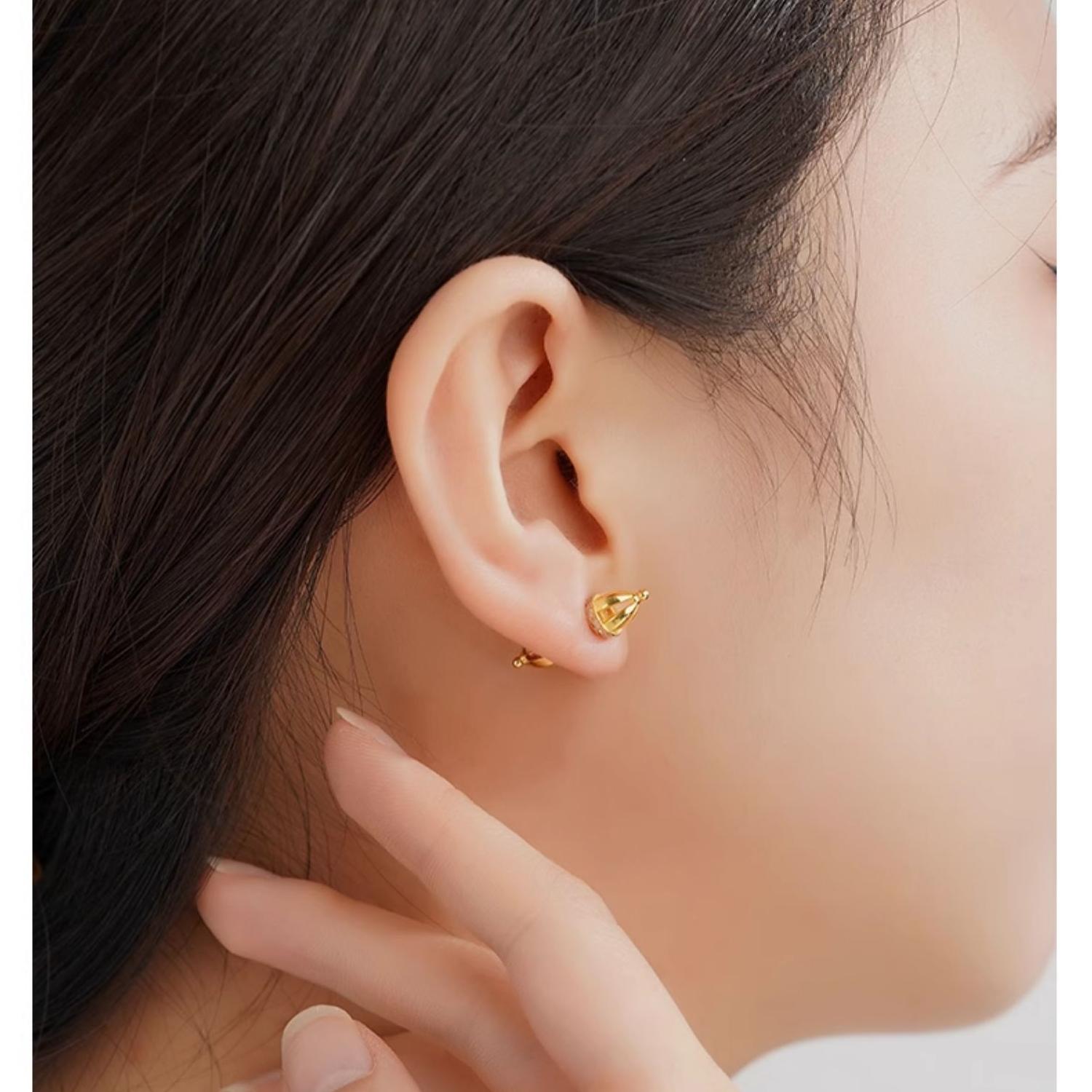 Elegant handmade Dorje earrings representing enlightenment and protection, crafted from pure silver.