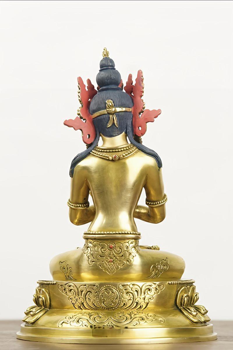 Traditional Tibetan Buddhist statuette of Vajradhara, the primordial teacher. Made of solid brass with a luxurious gold finish, representing high-quality Buddhist art.