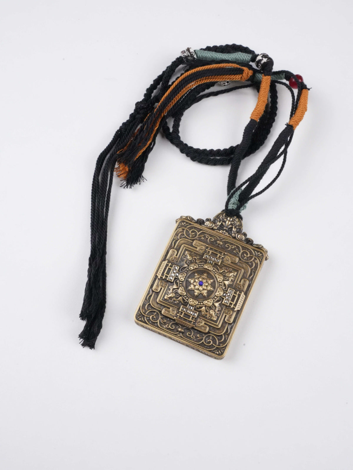 Tibetan Vajrapani Thangka painting pendant offering protection from obstacles and fear.