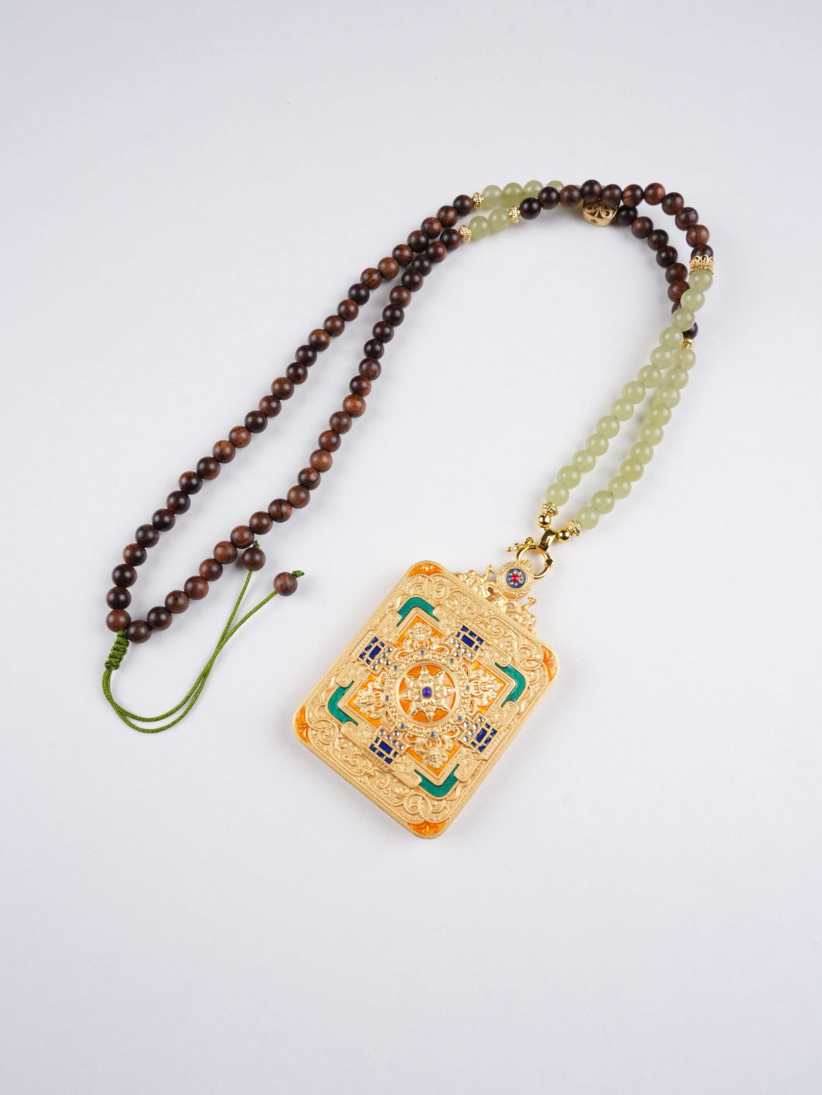 Mini Vajrapani Bodhisattva pendant — Tibetan Thangka painting symbolizing energy and wisdom.