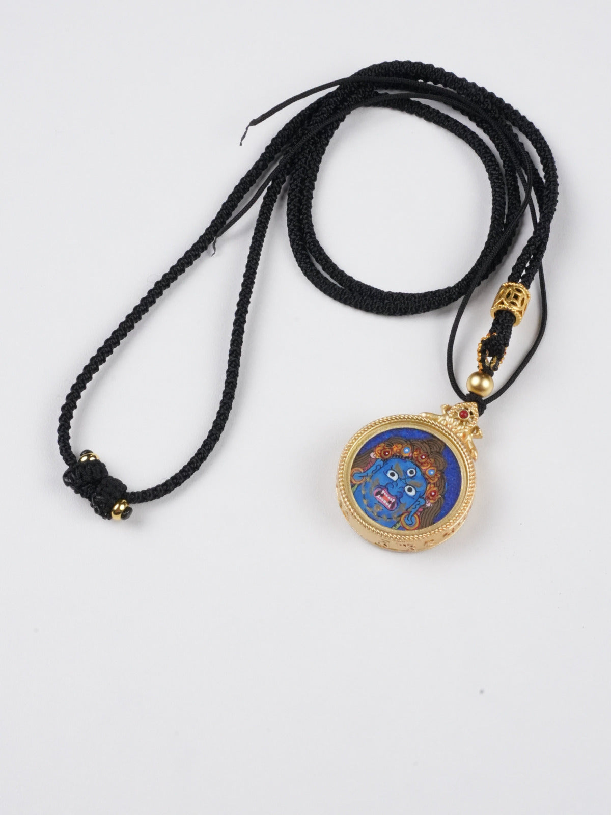 Vajrapani thangka pendant with mineral pigments - authentic craftsmanship for spiritual strength