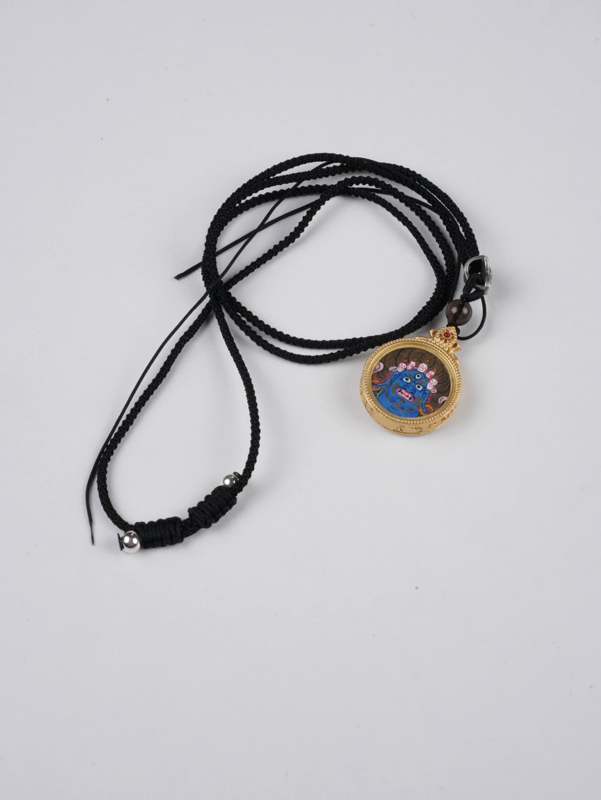 Vajrapani thangka pendant with mineral pigments - authentic craftsmanship for courage and strength