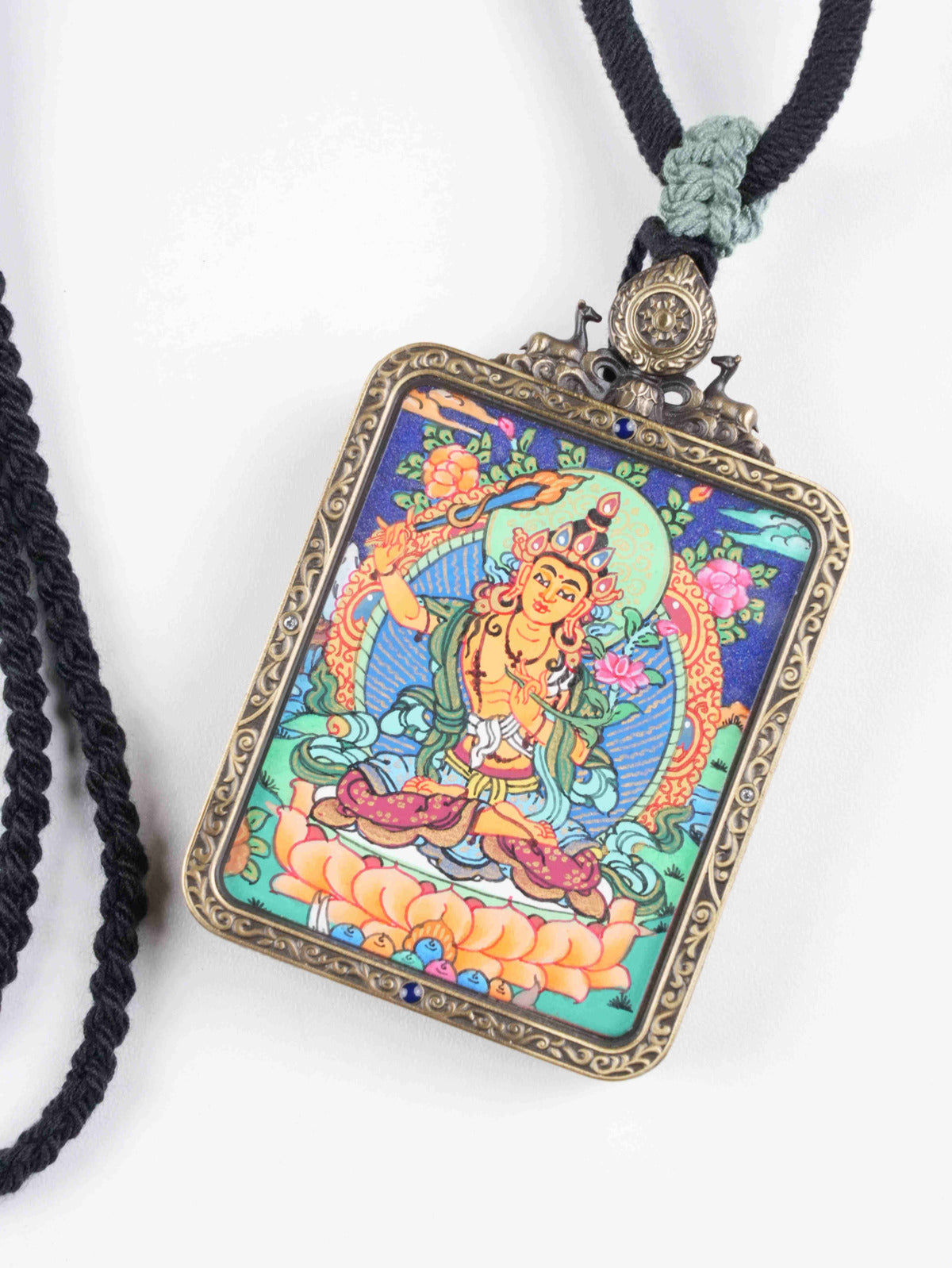 Mini Tibetan thangka pendant of Vajrapani, Bodhisattva of Power, hand-painted zodiac protector artwork representing fearless compassion and divine energy.