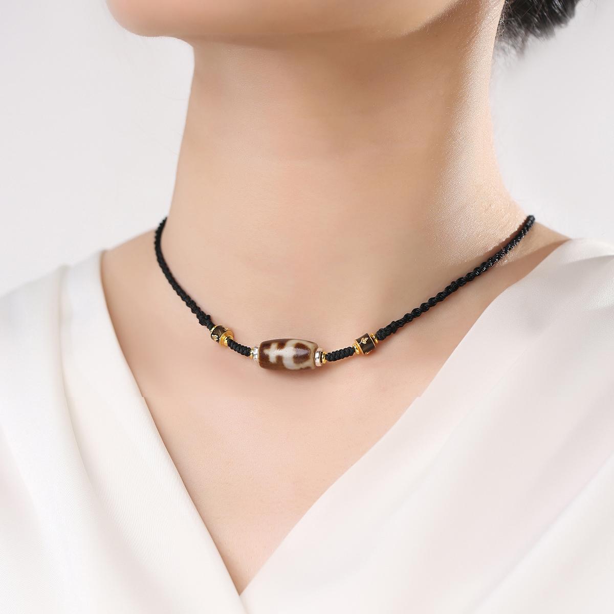 Handmade treasure vase Dzi agate necklace symbolizing abundance and purification.