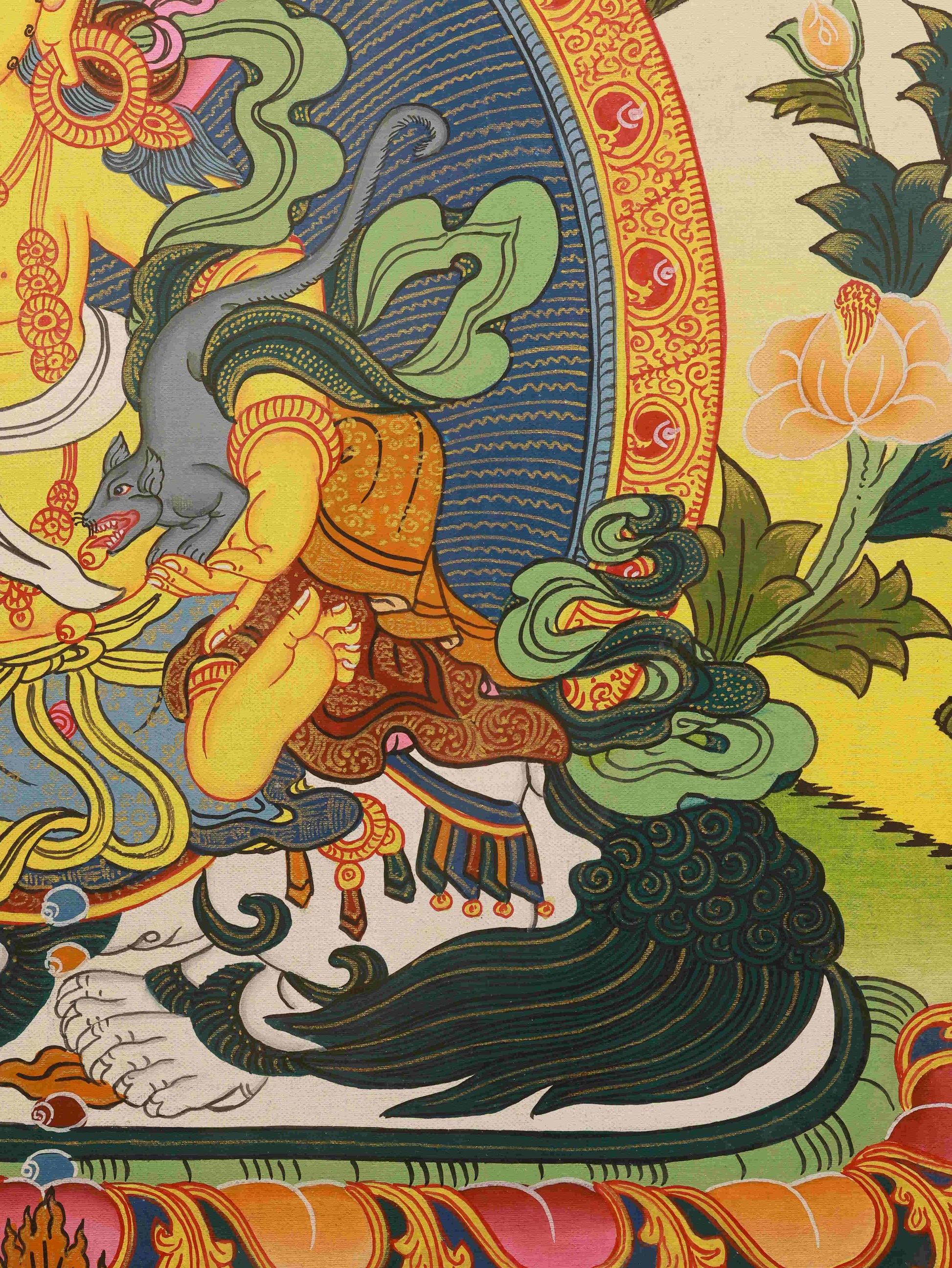 Vibrant Tibetan Buddhist Thangka art of Yellow Jambhala on handmade canvas, enhancing home or shrine energy of abundance.