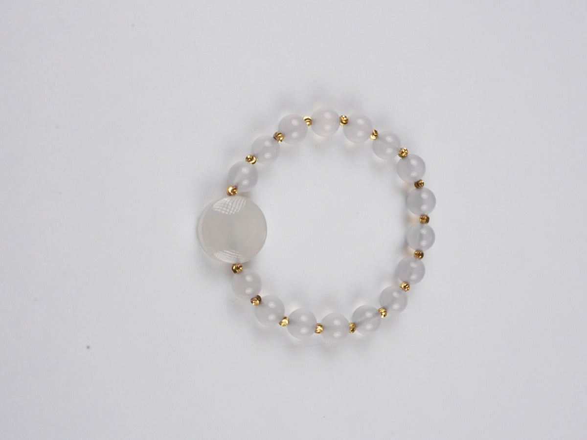 Tibetan Buddhist White Tara wrist bracelet with hand-painted thangka art, representing compassion, serenity, and spiritual protection.