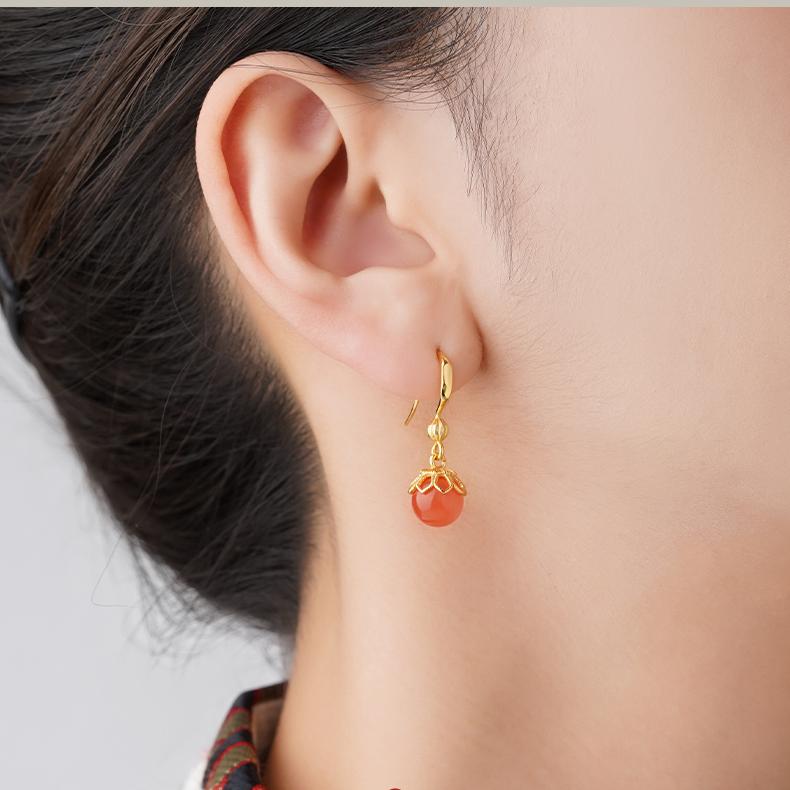 "Handcrafted 925 silver ear pendants with South Red Coral, designed to promote spiritual balance and inner peace."