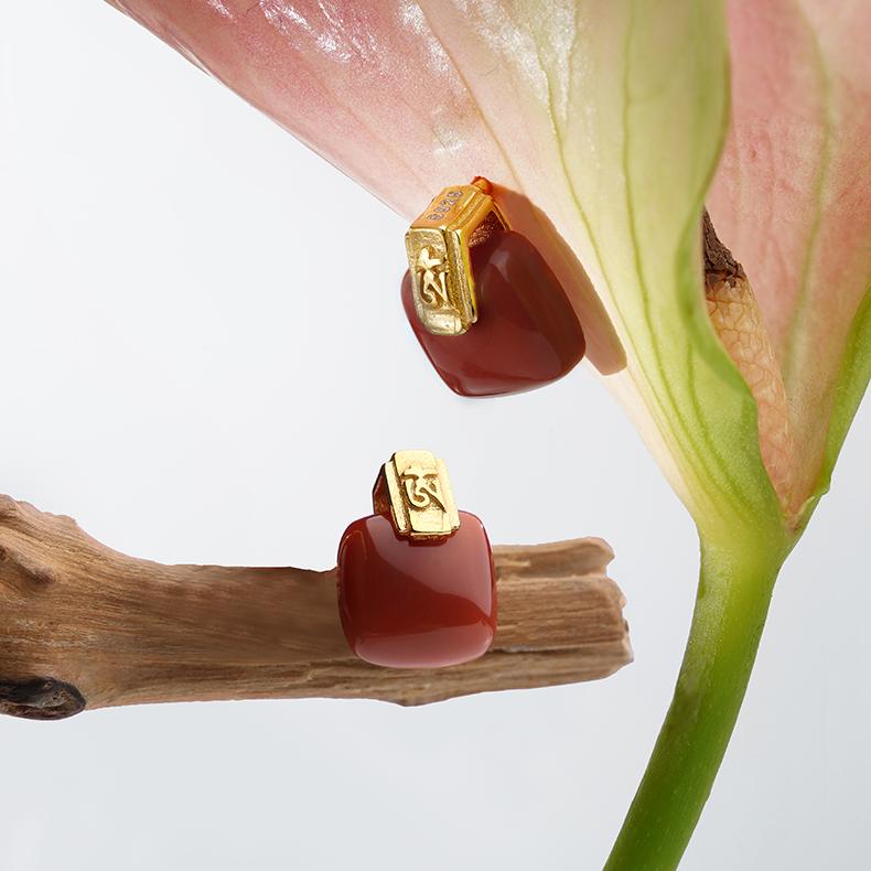 "Elegant South Red Coral earrings in 925 silver, handcrafted with Tibetan Buddhist influences for spiritual and aesthetic balance."