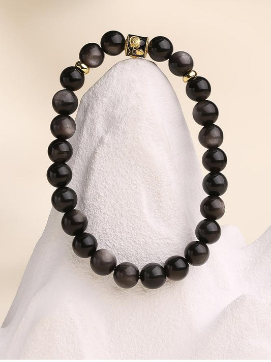 Tibetan-Buddhist Silver Obsidian Bracelet featuring copper Luotong bead and hand-strung craftsmanship.