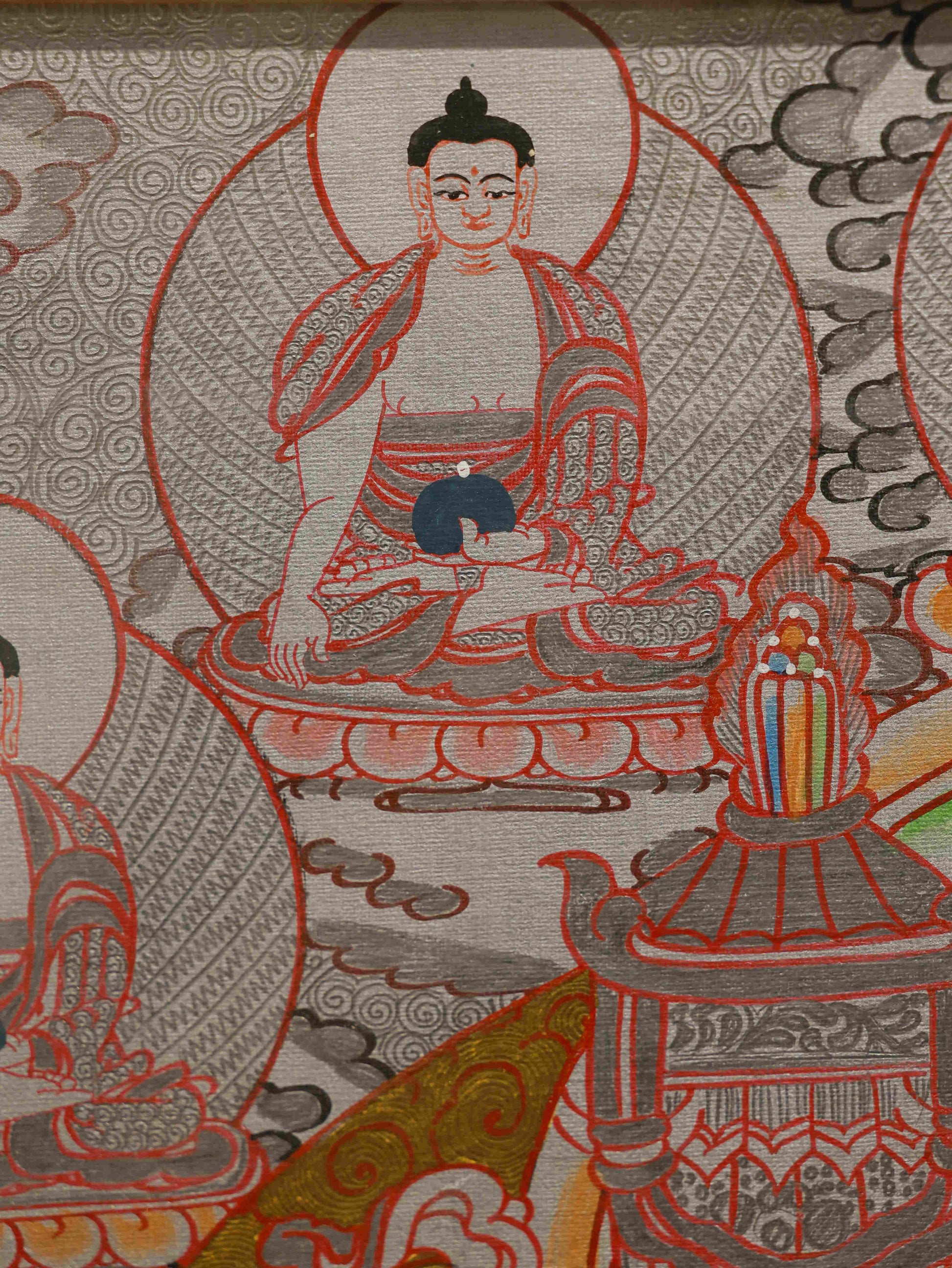 Buddhist Thangka of Yellow Dzambhala on canvas for spiritual wealth.