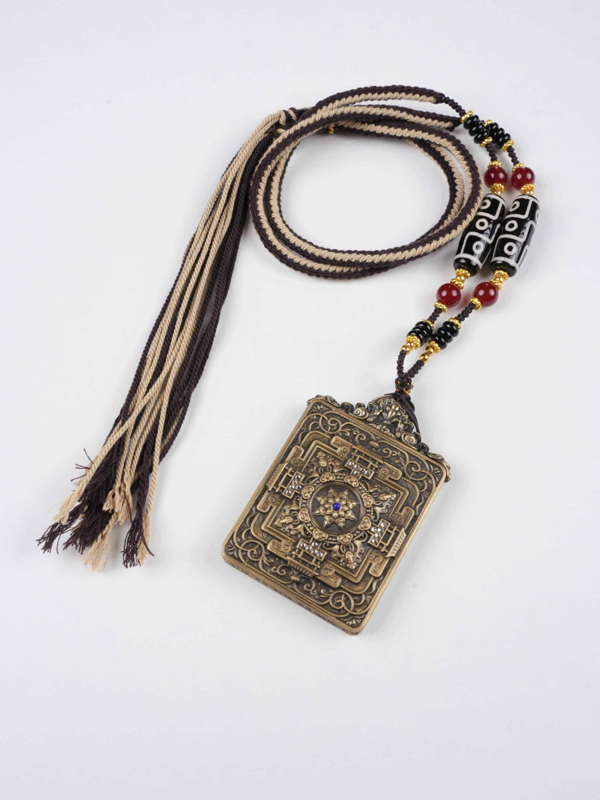 Traditional Tibetan Buddhist Yellow Jambhala thangka pendant for zodiac protection and financial success.
