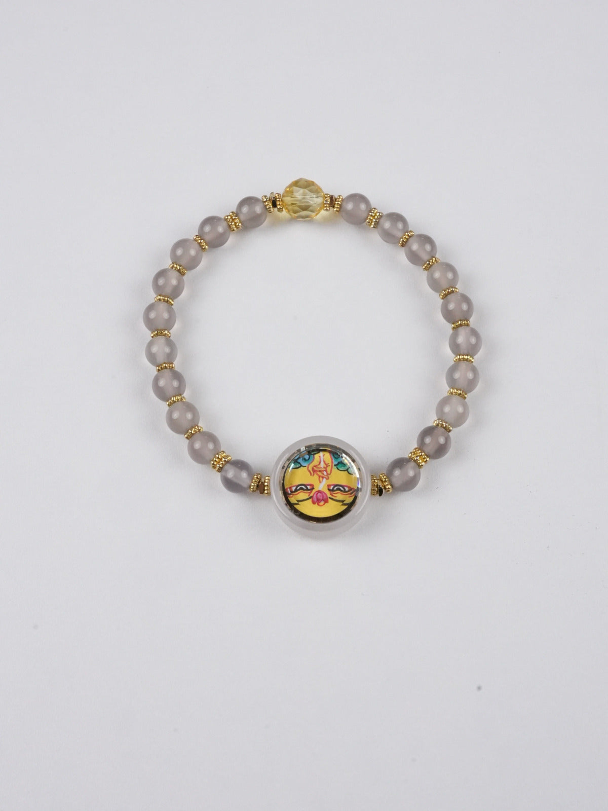 Authentic Tibetan-Buddhist Dzambhala mini Thangka bracelet painted with mineral pigments, a sacred Buddha art piece invoking blessings of wealth and protection