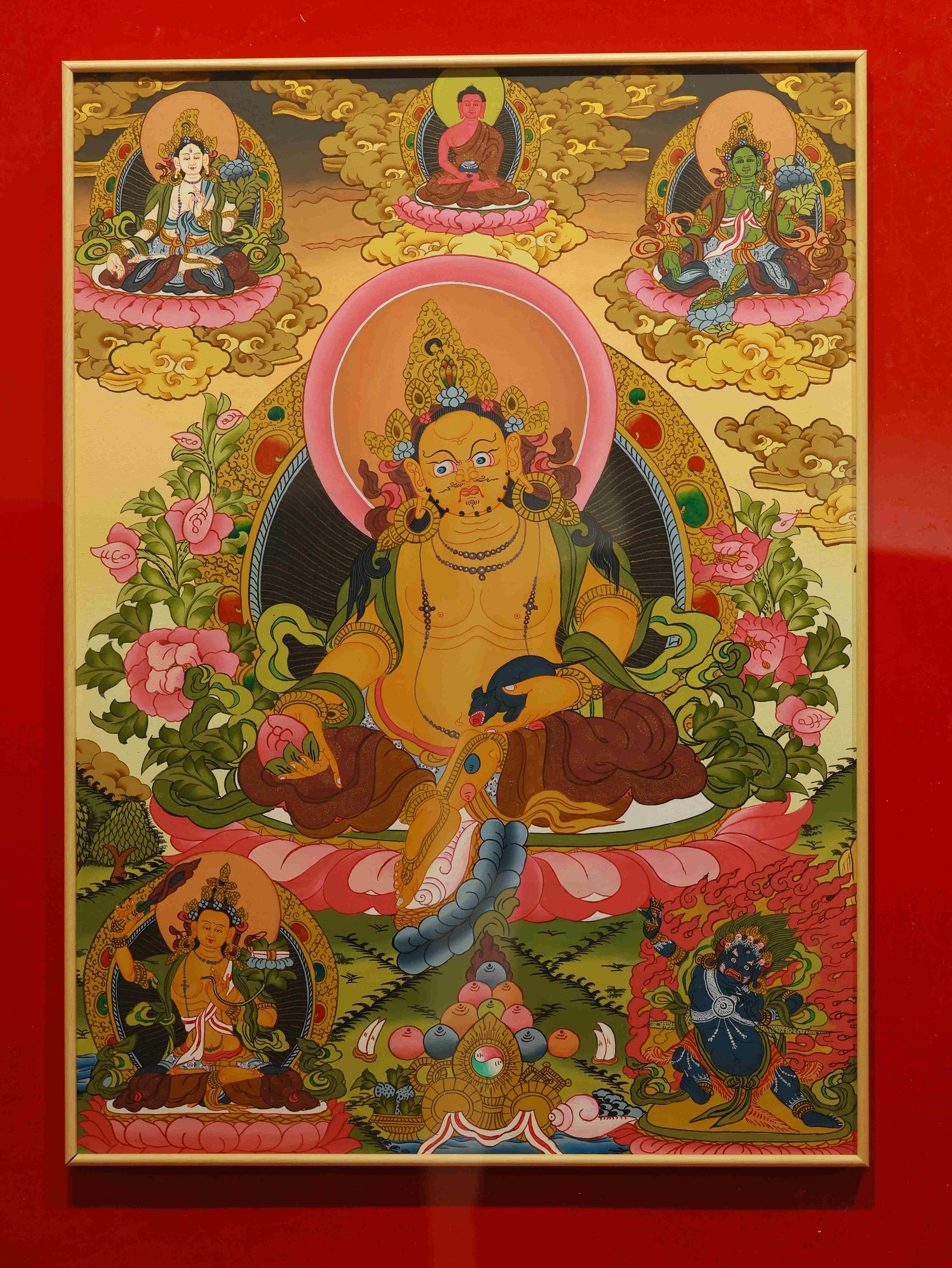 Buddhist Thangka of Yellow Dzambhala for attracting wealth and removing obstacles.