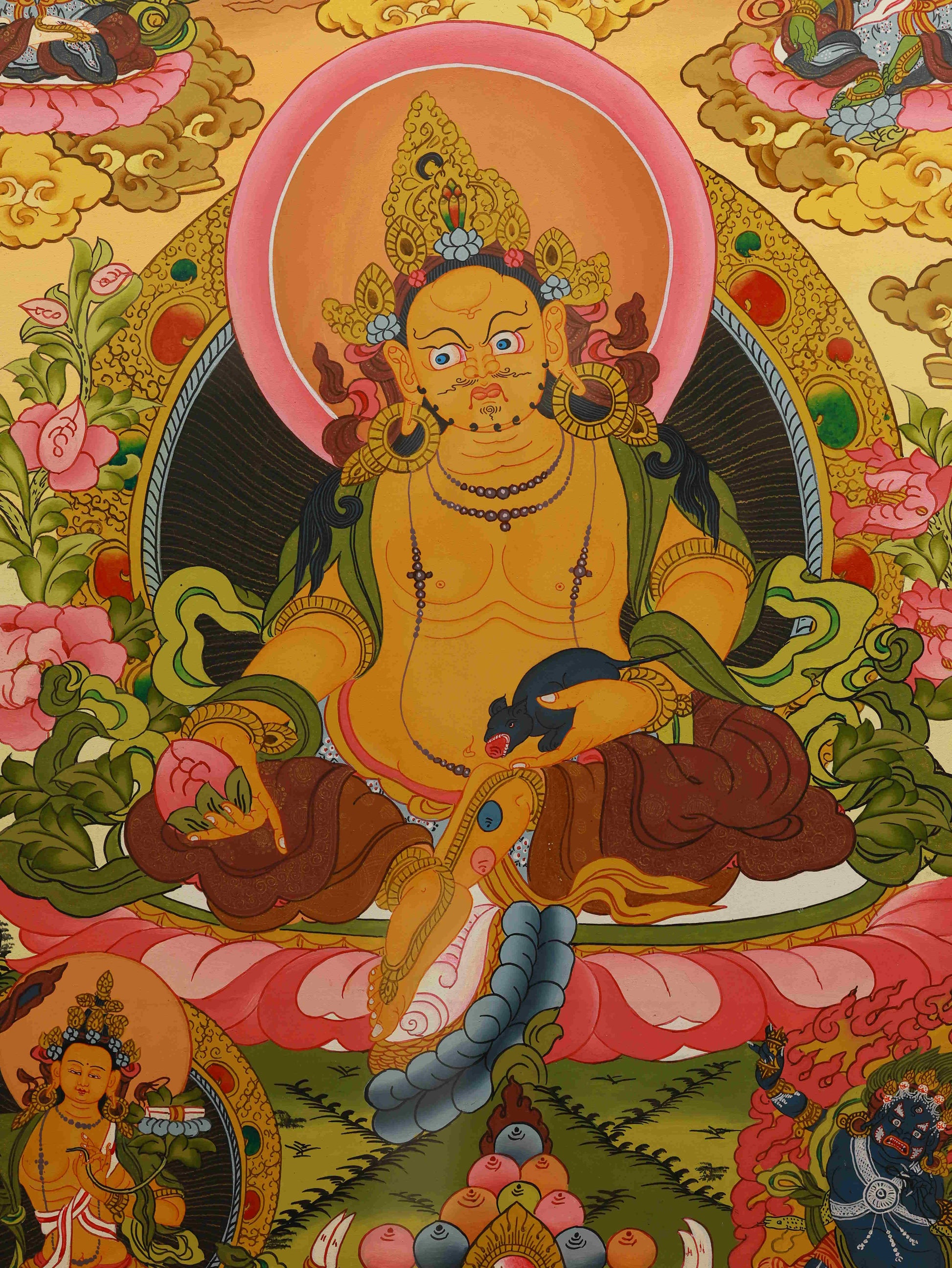 Tibetan Thangka painting of Jambhala, the Buddhist deity of prosperity.