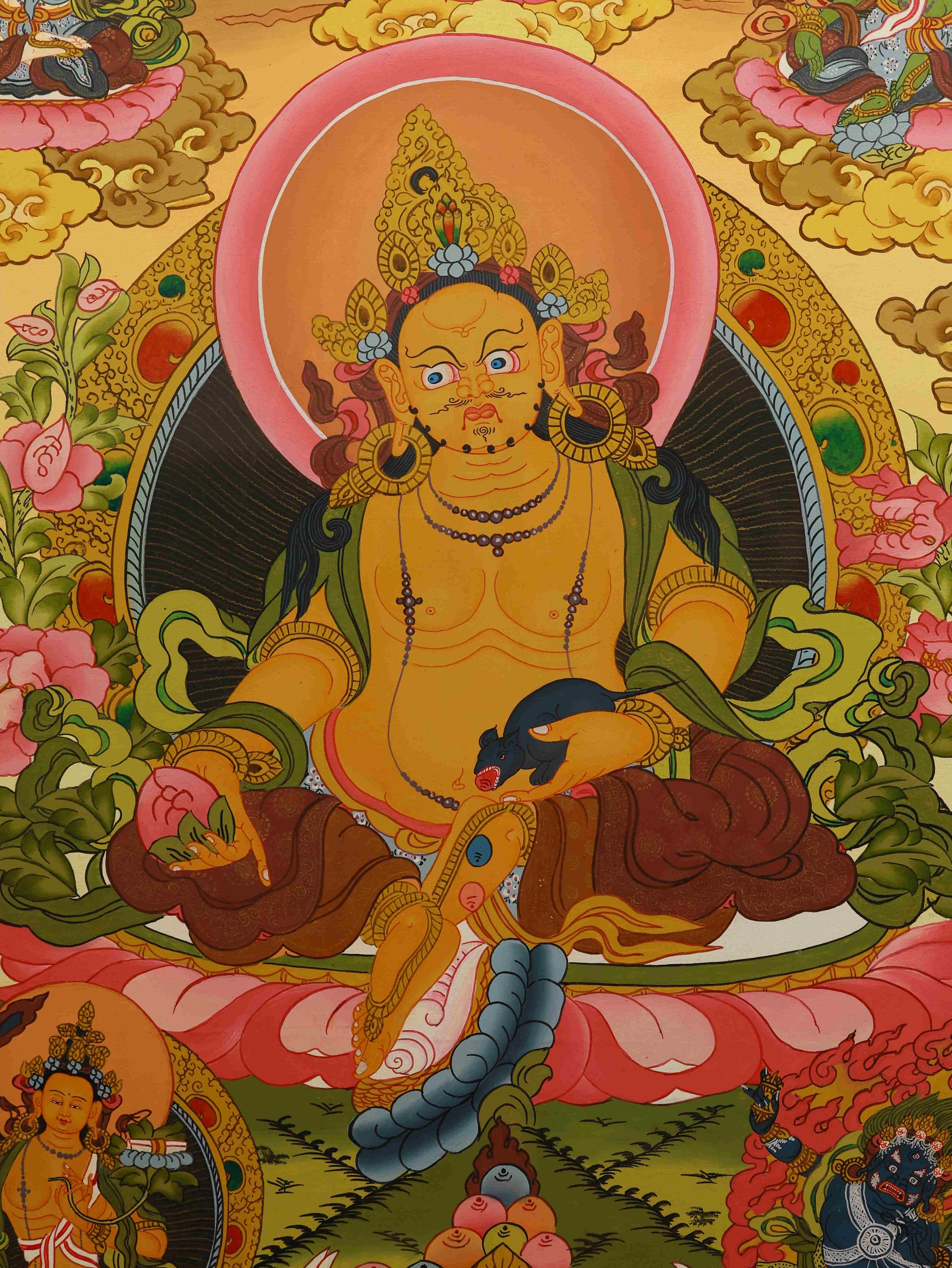 Handcrafted Tibetan Yellow Dzambhala Thangka with sacred details and colors.