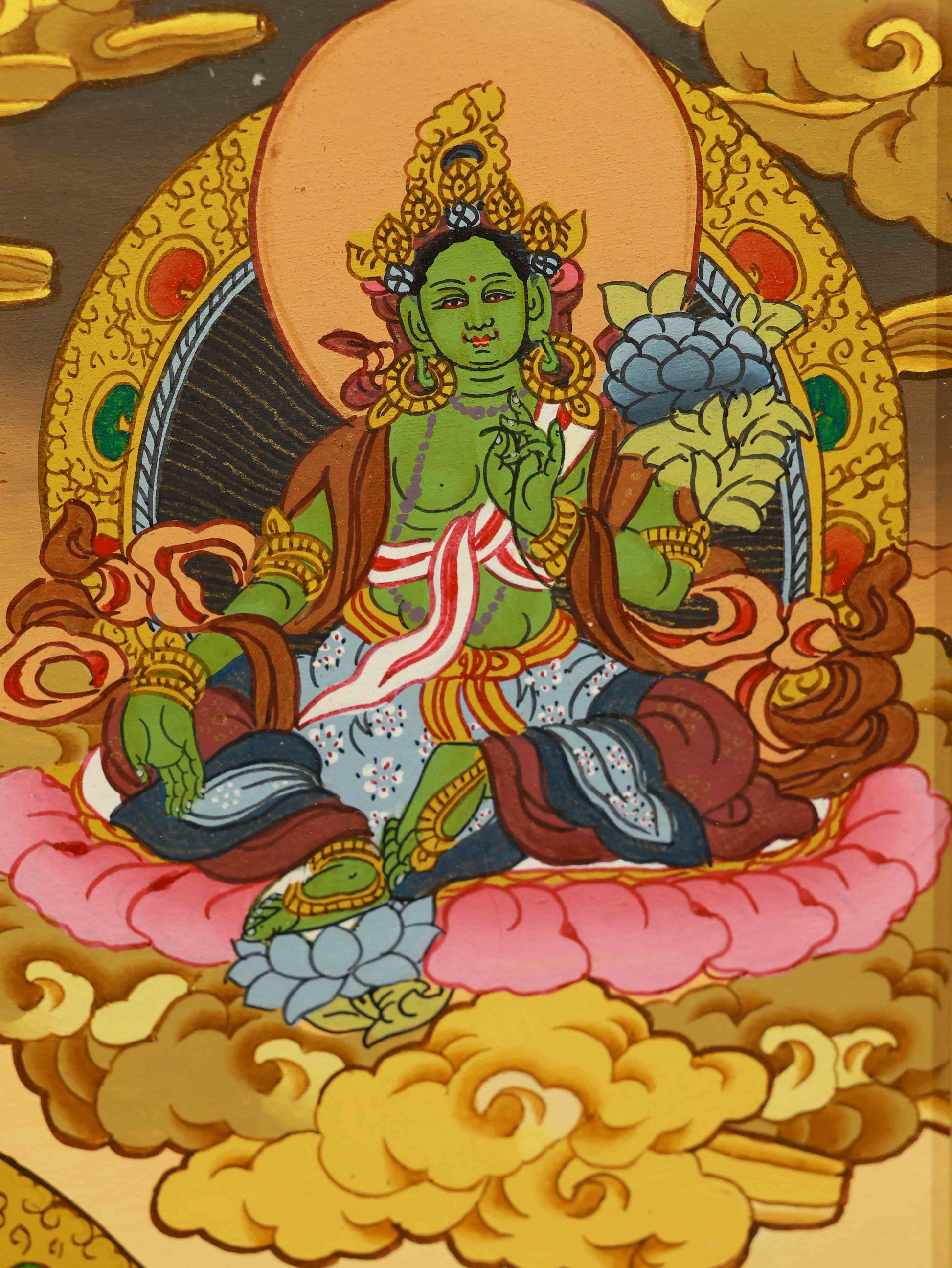 Hand-painted Tibetan Buddhist Thangka depicting Yellow Jambhala.