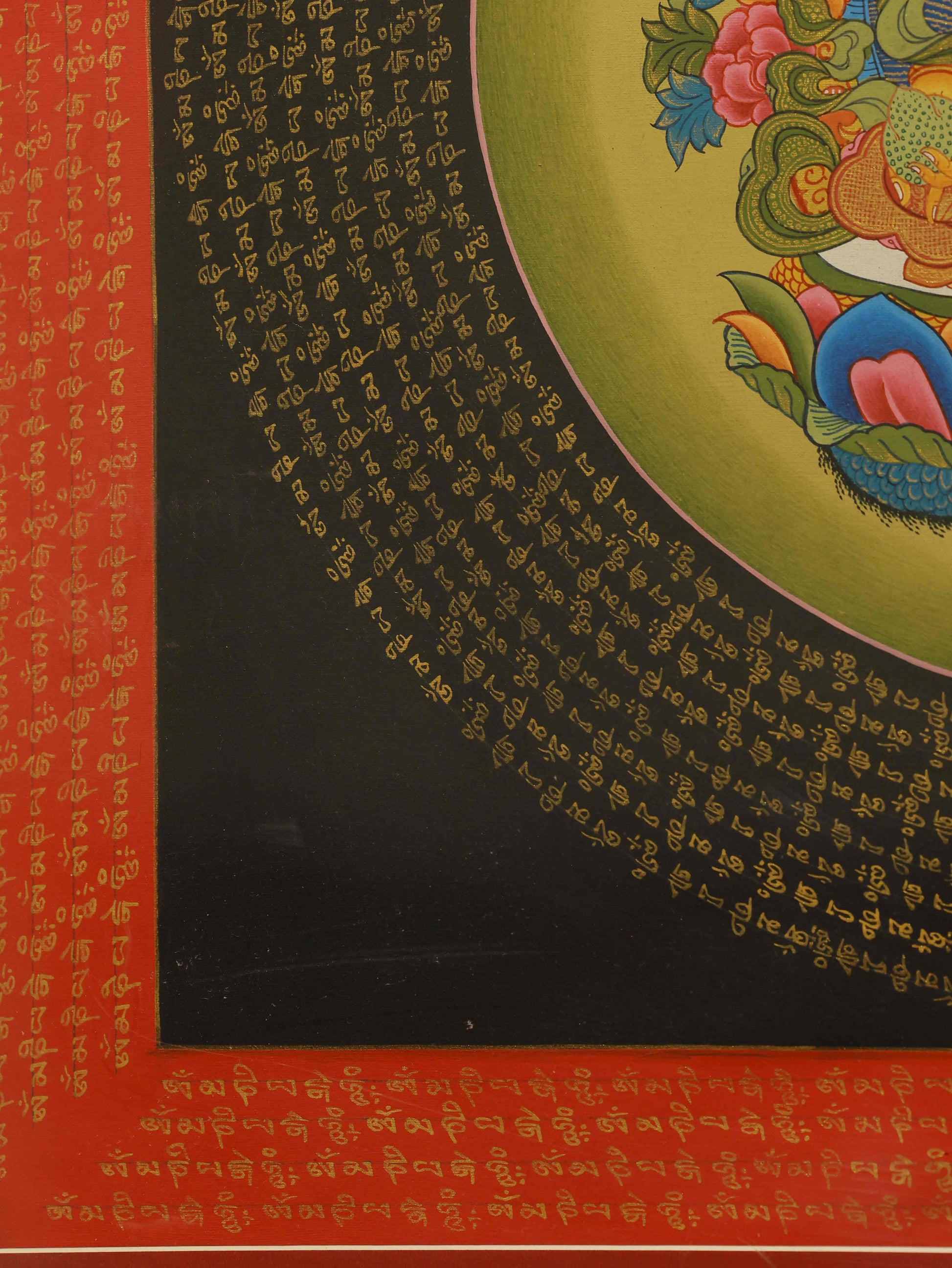 Traditional Tibetan Thangka painting of Yellow Jambhala, god of prosperity and generosity.