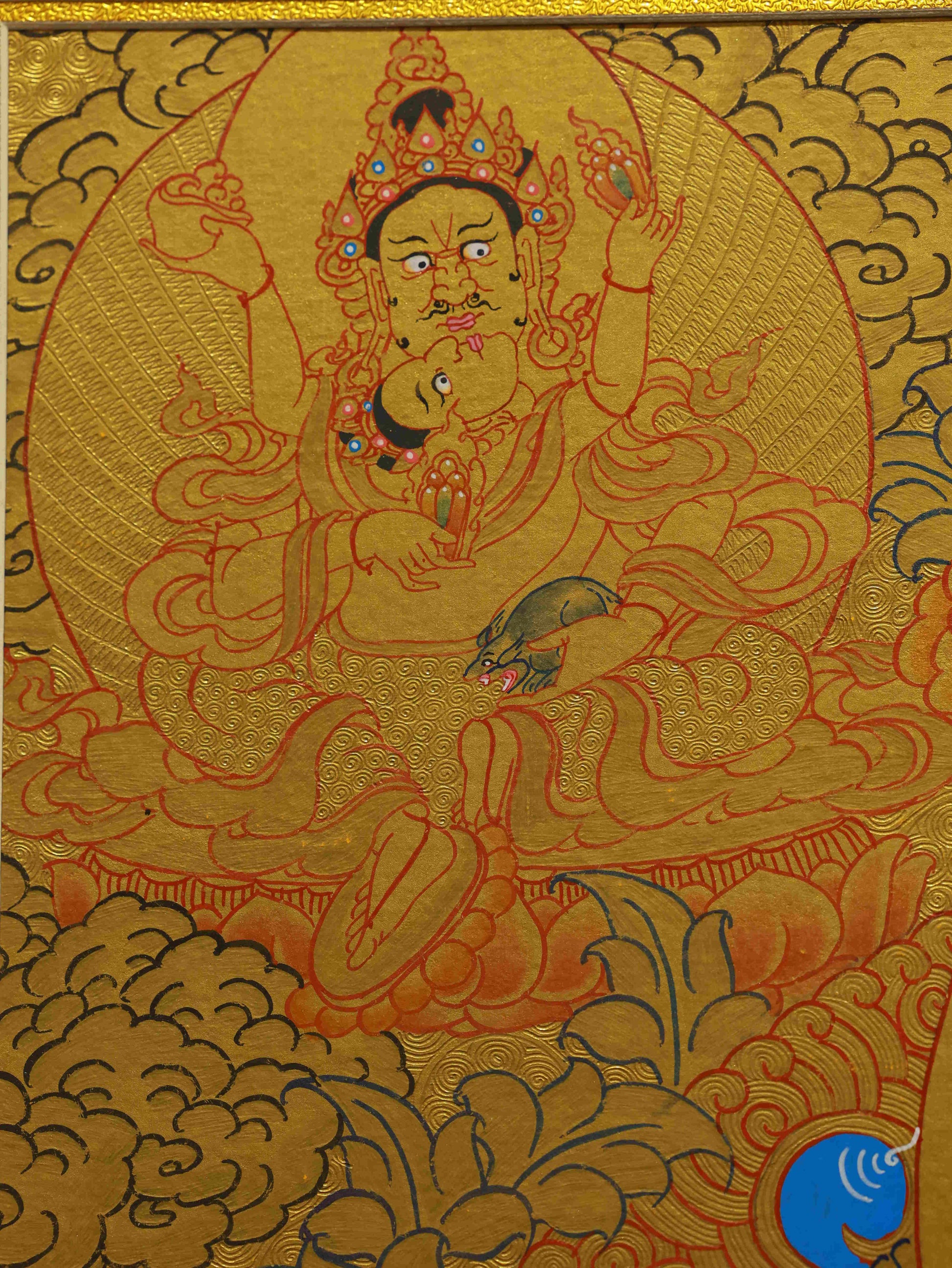 Authentic Yellow Jambhala Thangka with gold foil details, symbolizing wealth, generosity, and abundance.