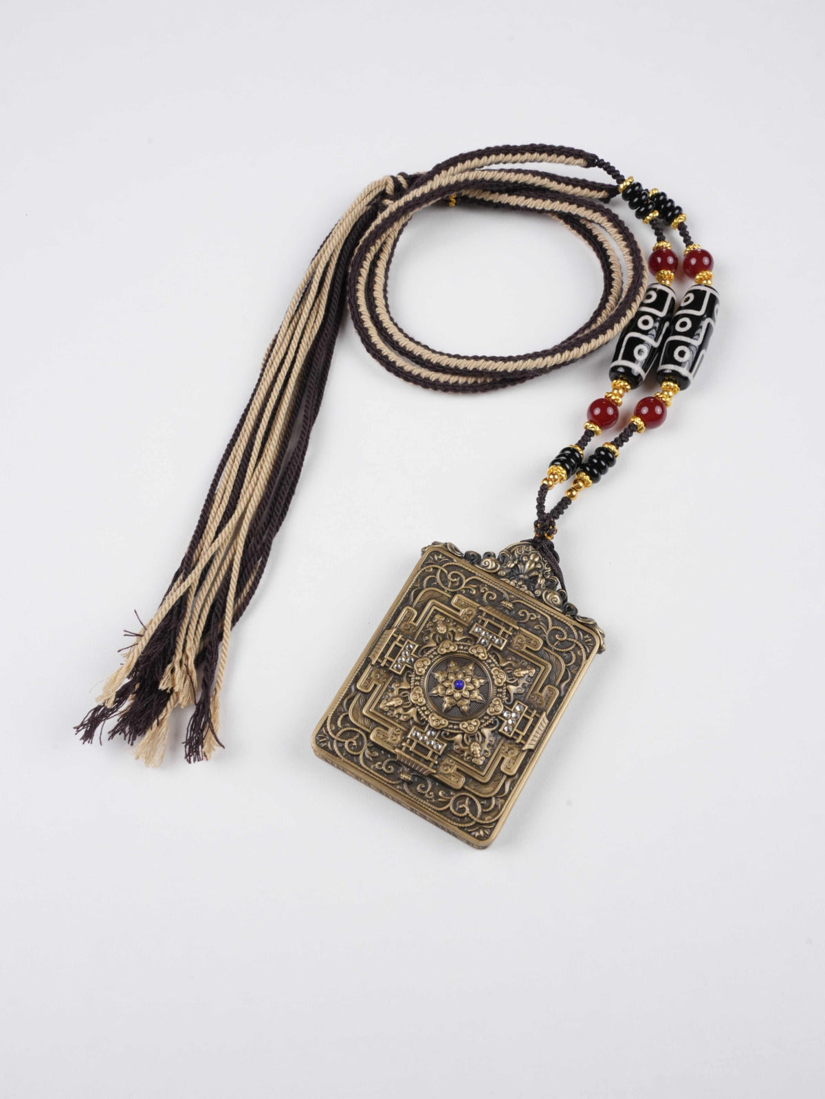 Authentic handmade Tibetan thangka painting of Yellow Dzambhala – guardian of prosperity and good fortune.