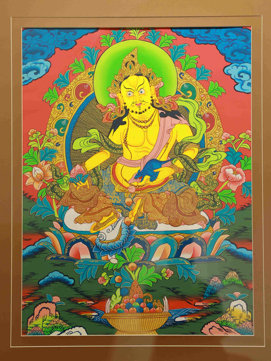 Hand-painted Yellow Jambhala Tibetan Thangka symbolizing wealth, abundance, and prosperity.