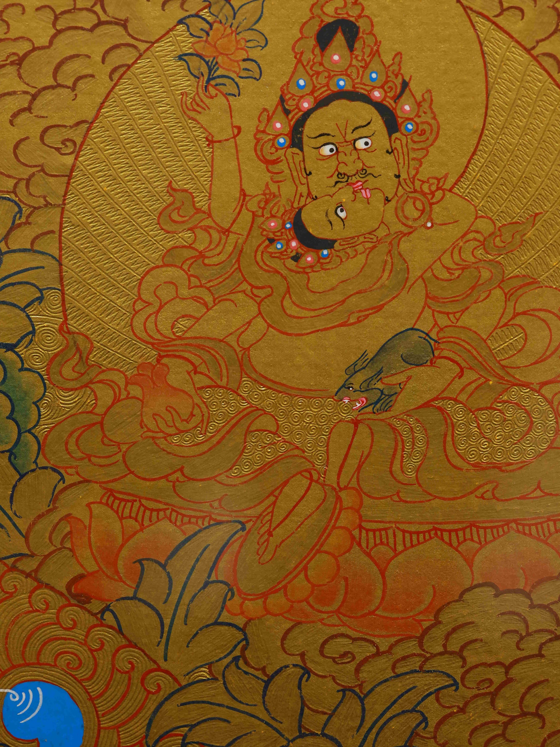 Handcrafted Yellow Jambhala Thangka art, representing the Tibetan Buddhist deity of wealth and fortune.