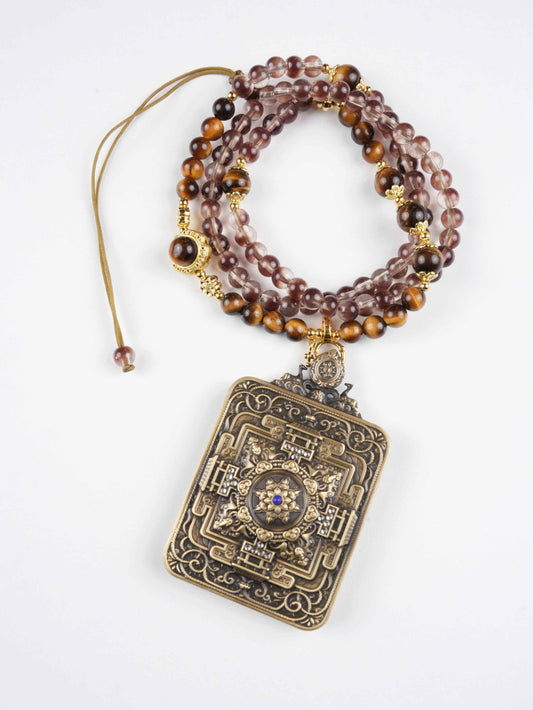 Meticulously handmade Yellow Jambhala thangka painting, a sacred Tibetan Buddhist art piece for prosperity.