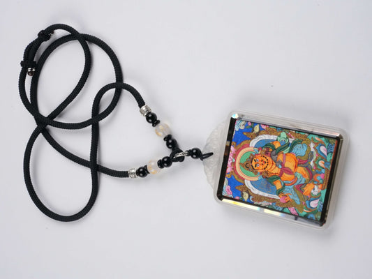 Handmade Yellow Jambhala thangka painting - traditional Tibetan Buddhist art with mineral pigments