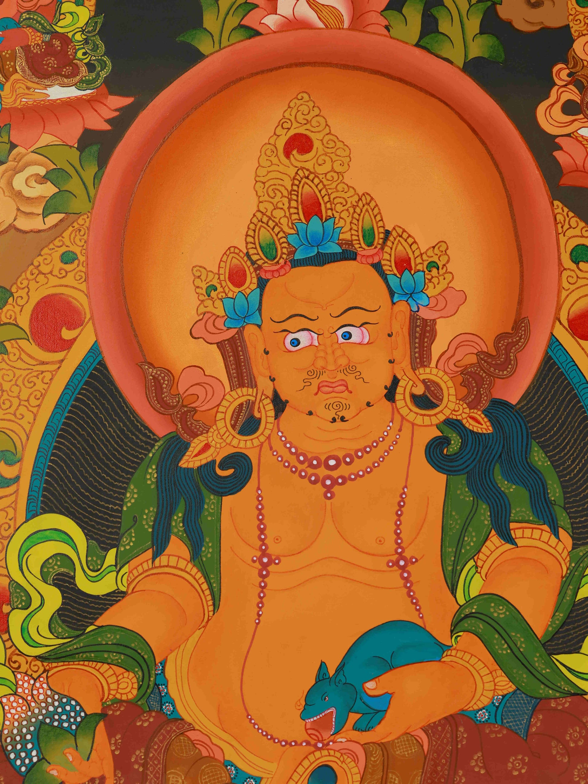 Handcrafted Tibetan Thangka painting of Yellow Jambhala, the Buddhist God of Wealth, painted on canvas.