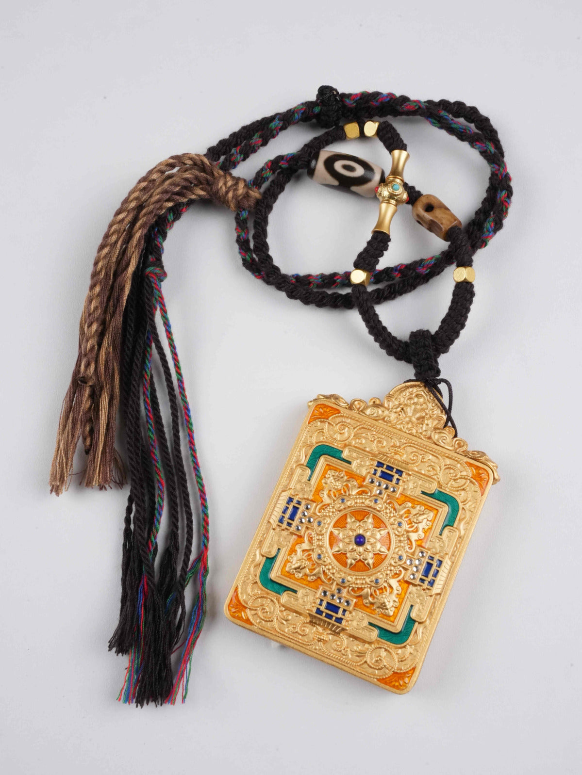 Yellow Jambhala thangka pendant with natural mineral pigments, authentic Tibetan Buddhist craftsmanship