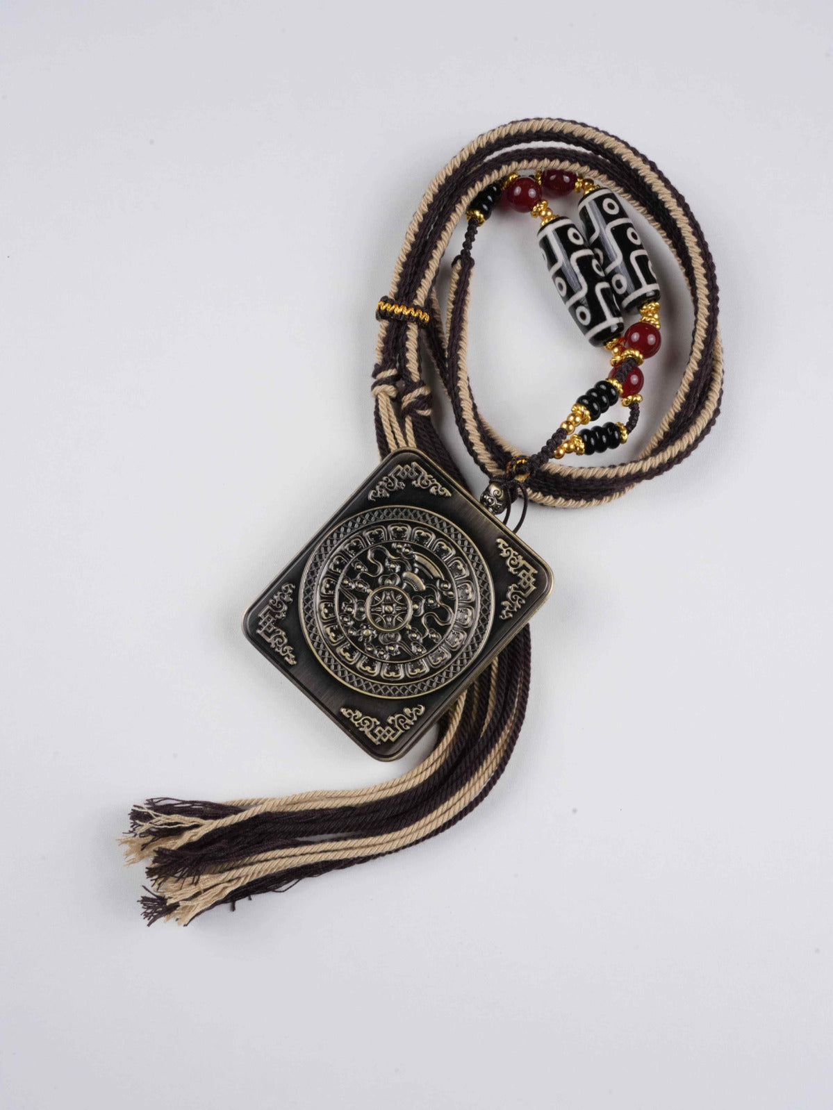 Yellow Jambhala thangka pendant with natural mineral pigments - Authentic craftsmanship