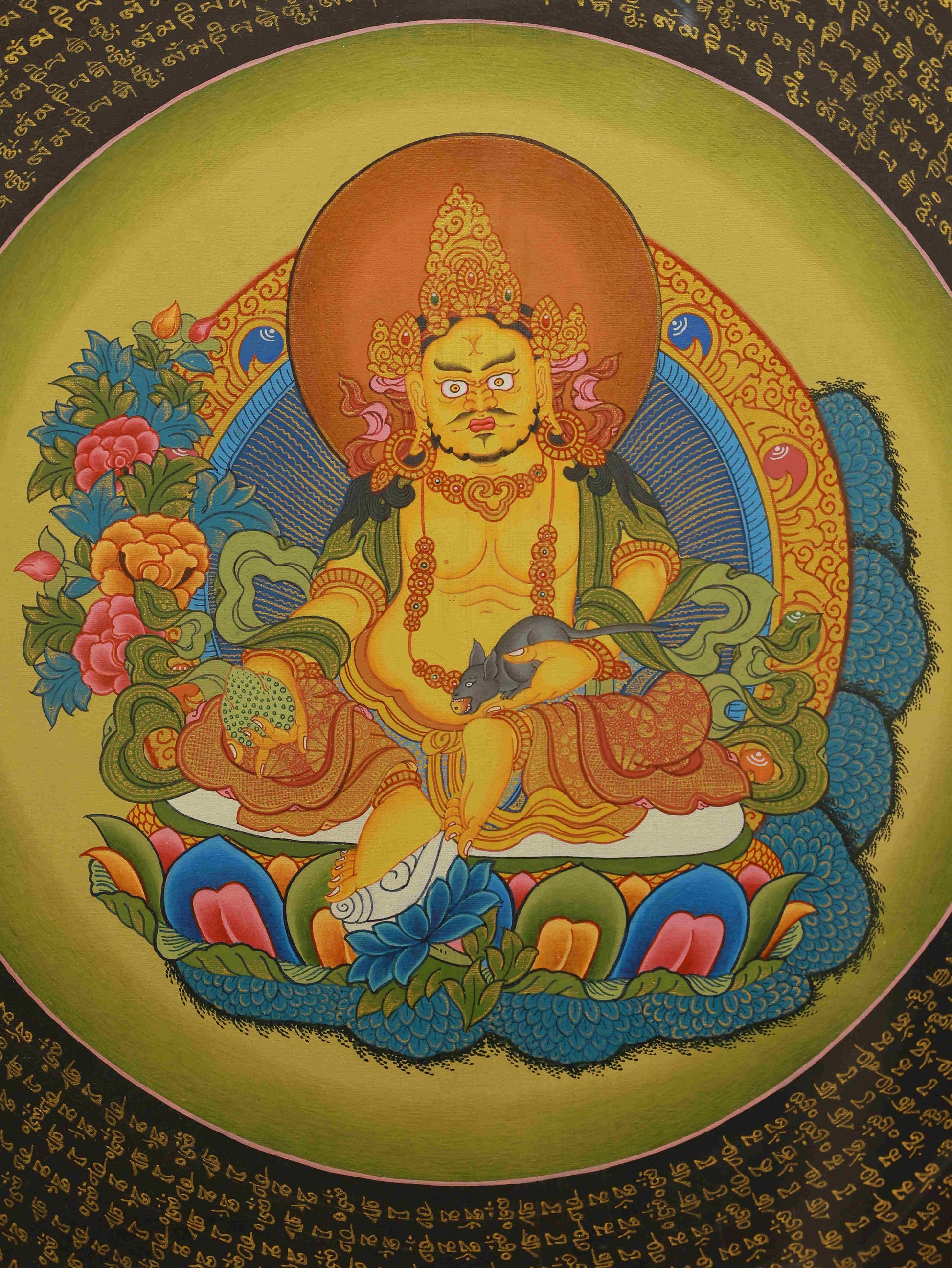 Tibetan Thangka of Yellow Jambhala hand-painted by artisans using mineral colors on sacred canvas.