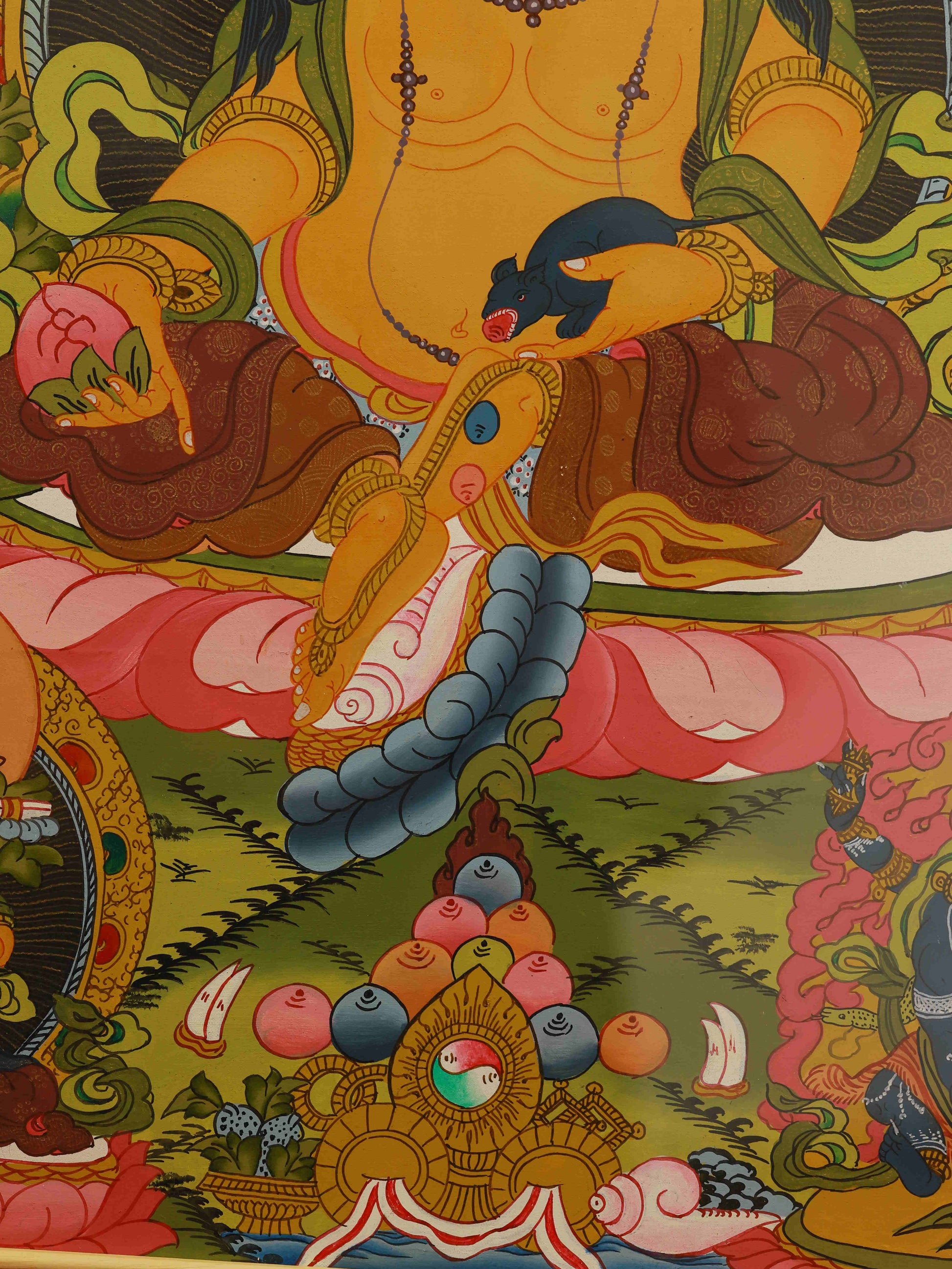 Tibetan Thangka painting of Yellow Dzambhala Bodhisattva on canvas.