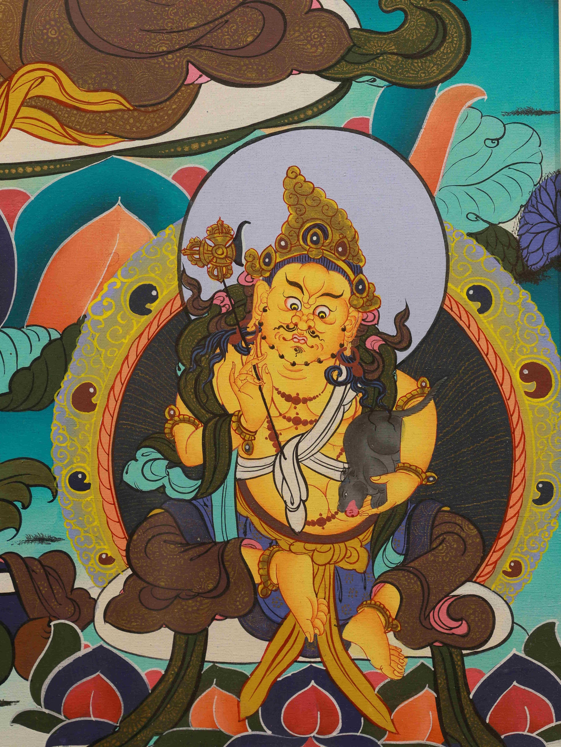Tibetan Buddhist Thangka painting of Yellow Jambhala, symbolizing prosperity, abundance, and spiritual fortune.
