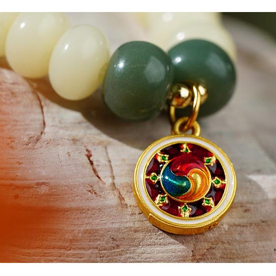 Tibetan-inspired Bodhi mala necklace Yunshui Jing handmade with alloy charm and natural Bodhi texture.