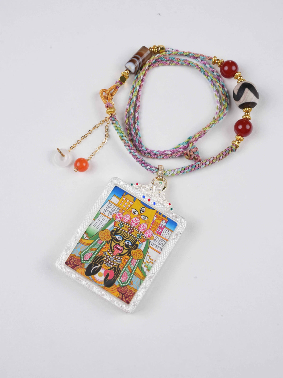 Zachi Lhamo Goddess Pendant – Tibetan Buddhist thangka painting of divine feminine strength and fortune.