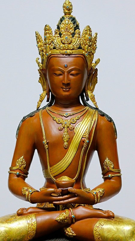 "Intricate Tibetan Buddhist Zanabazar Amitabha Buddha statue, handcrafted with copper and mineral painting, a powerful spiritual symbol for your space." 