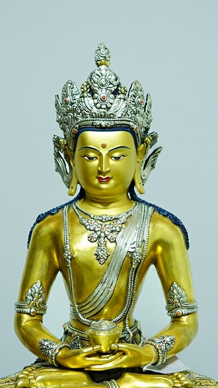  "Handcrafted Tibetan Buddhist Zanabazar Amitabha Buddha statue made from copper and painted with mineral pigments, a perfect blend of spiritual and artistic craftsmanship." 