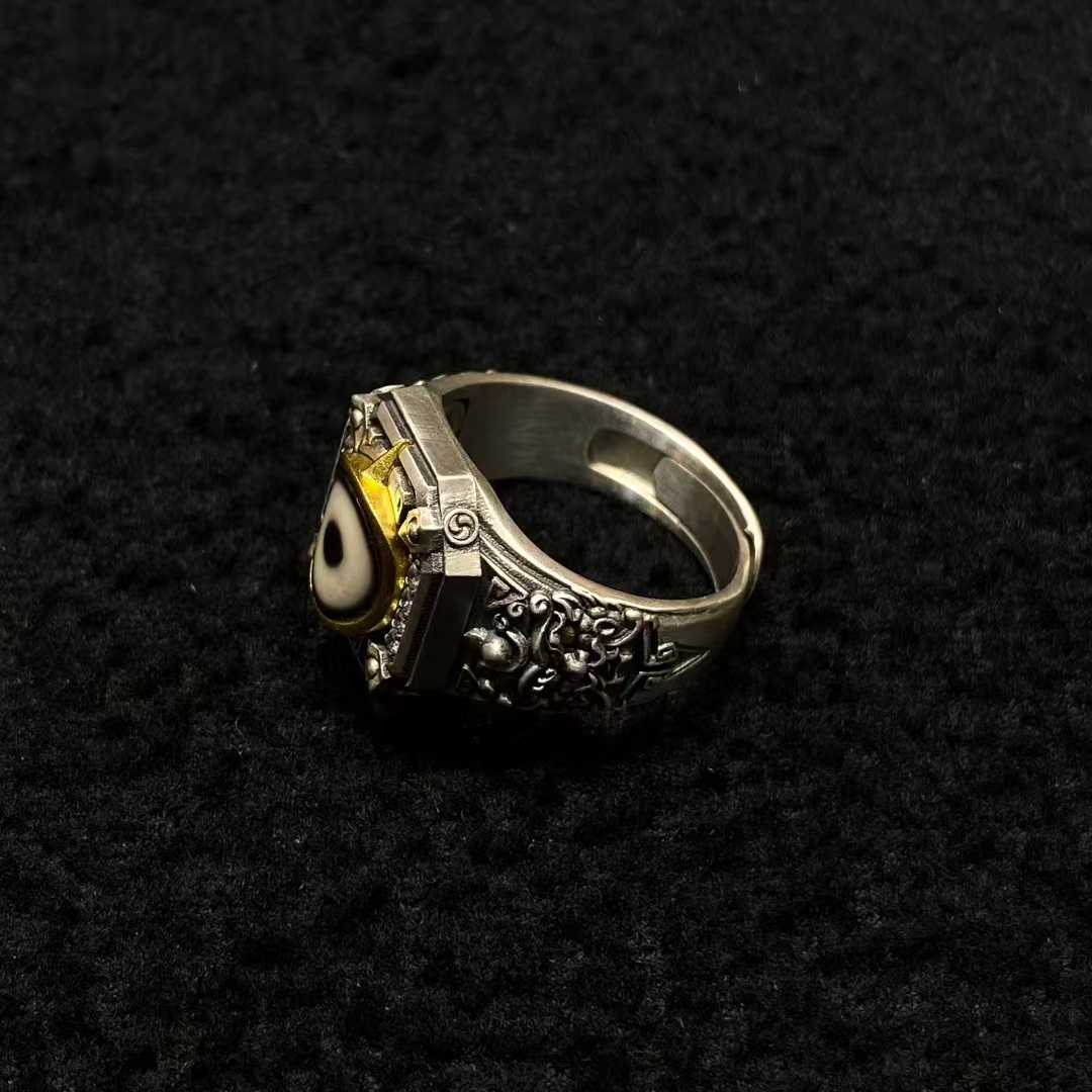 Tibetan Buddhist Zhiba Zha ring designed in S925 silver with polished, naturally aged surface.
