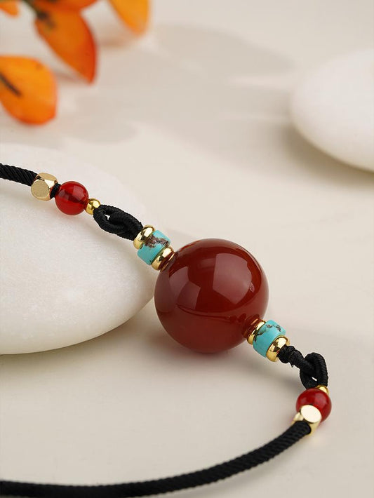 Handmade Tibetan Agate Cinnabar Pendant with Copper Alloy Spacers for Spiritual Healing and Protection.