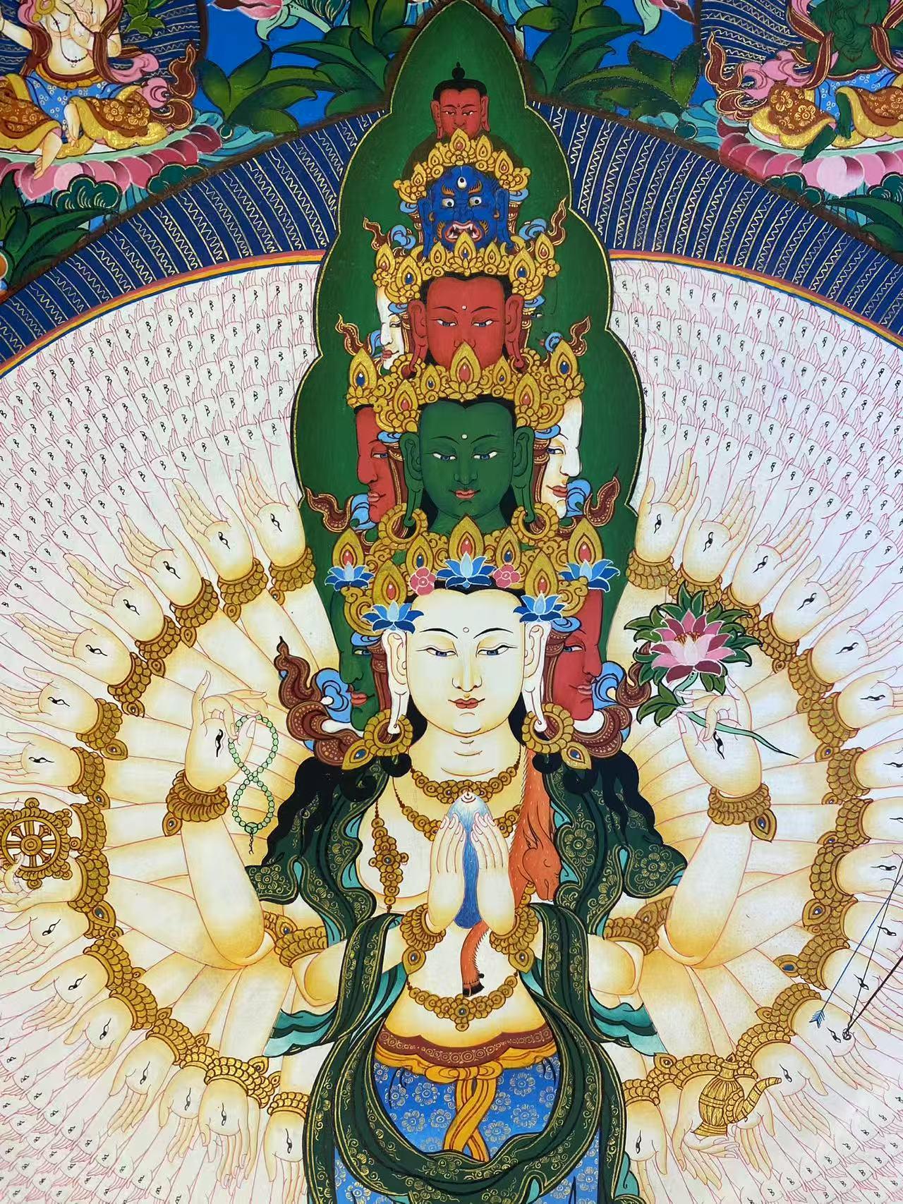 Intricate Tibetan Buddhist thousand-arm Guanyin thangka painting on canvas, using mineral colors and traditional techniques.