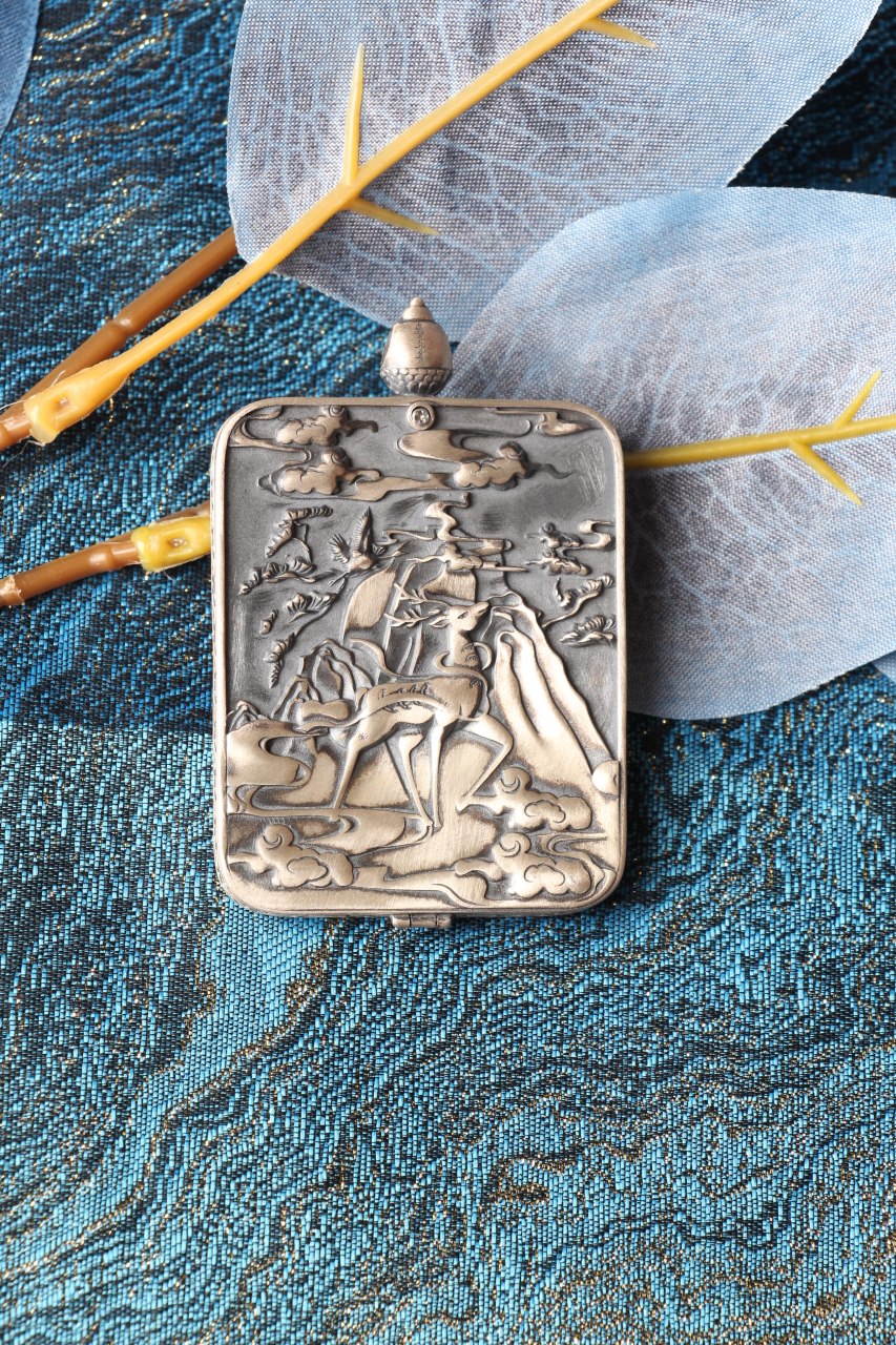 The complete Four-Armed Chenrezig Thangka pendant as a sacred heirloom, showcasing the brilliant Rebgong artistry and heritage Dunhuang casing.