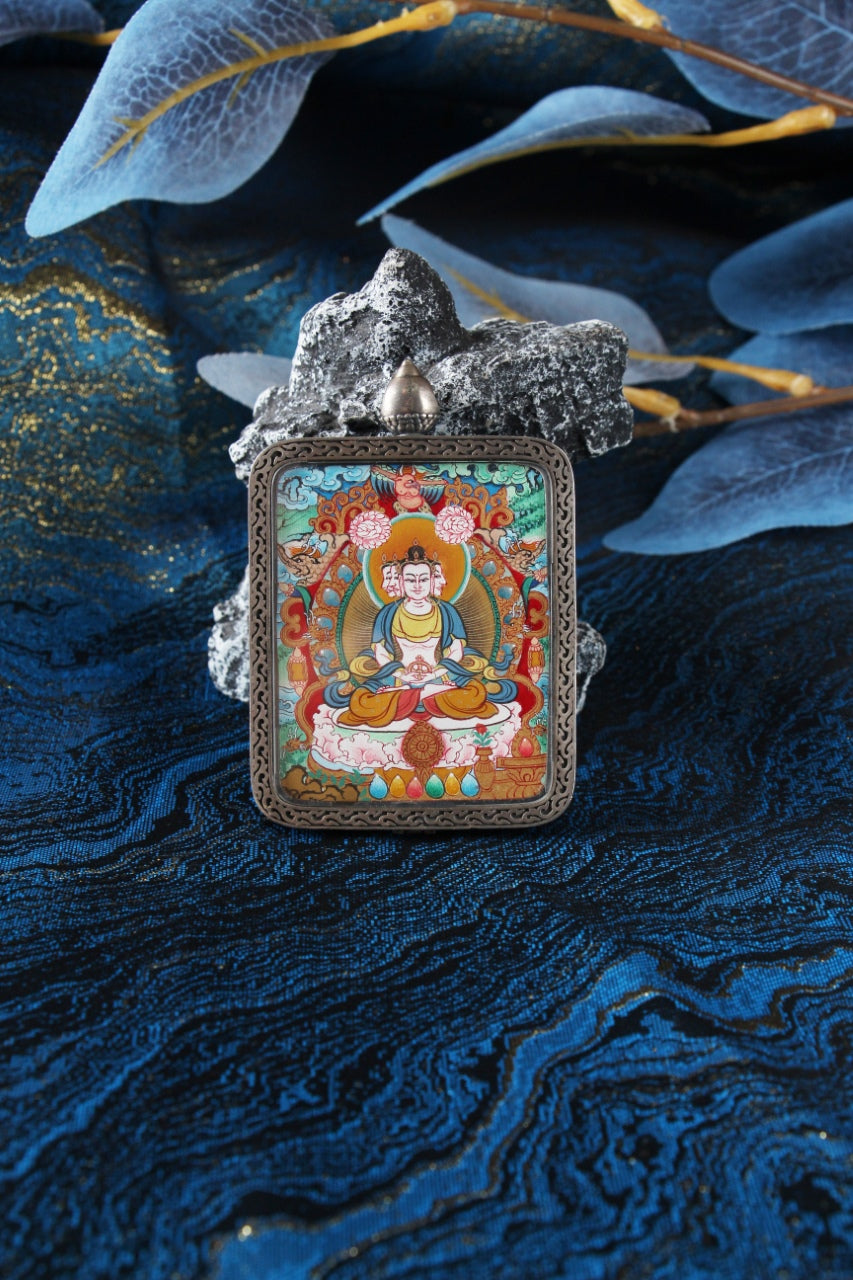 A collector-grade 4x5cm hand-painted Vairocana Buddha (Daji Rulai) Thangka in Menri style, featuring the Great Sun Buddha in a silver Nine-Colored Deer frame.