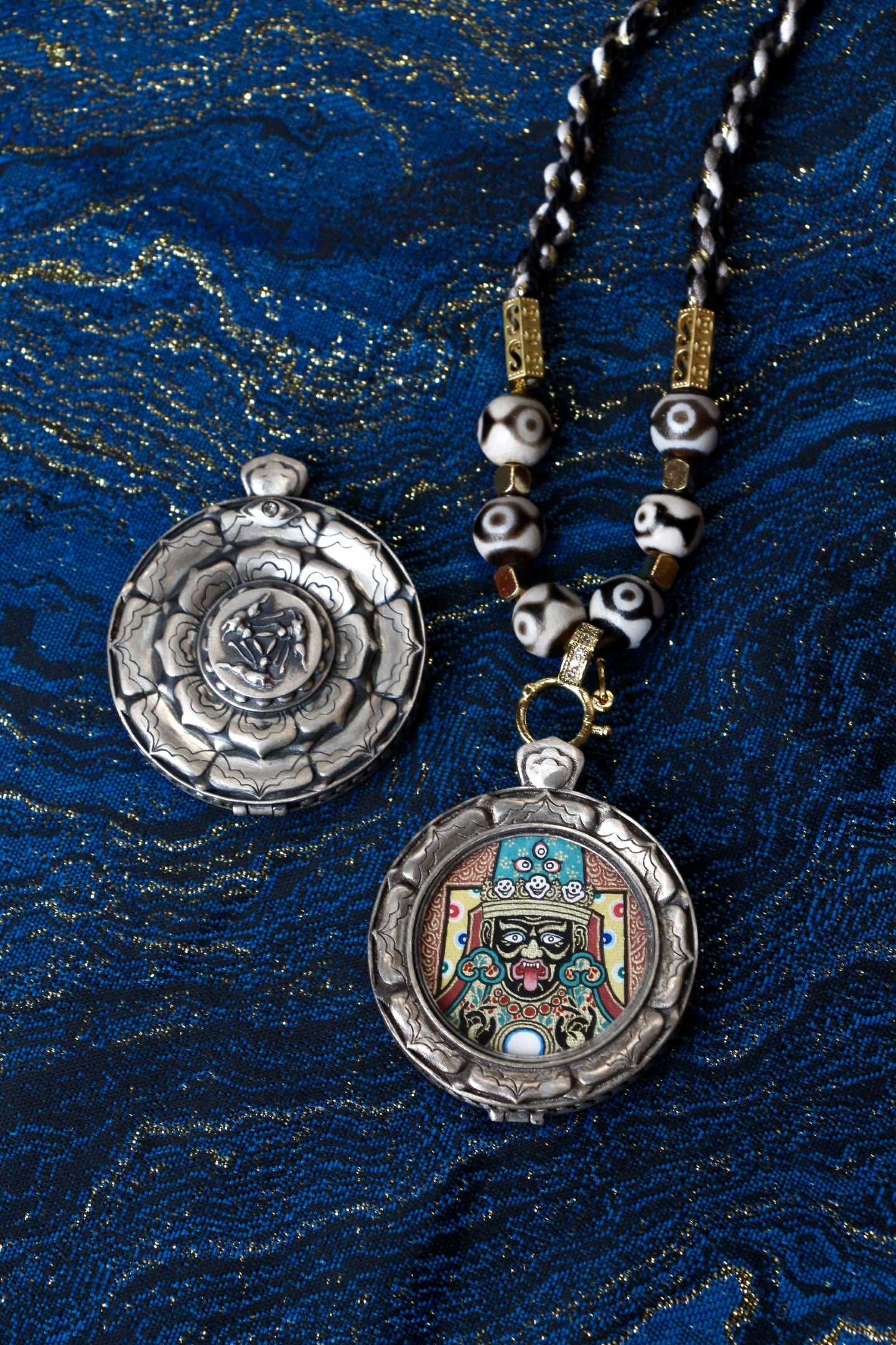 A portable Zaki Lhamo Thangka amulet, symbolized as the most auspicious female wealth deity for prosperity and personal strength.